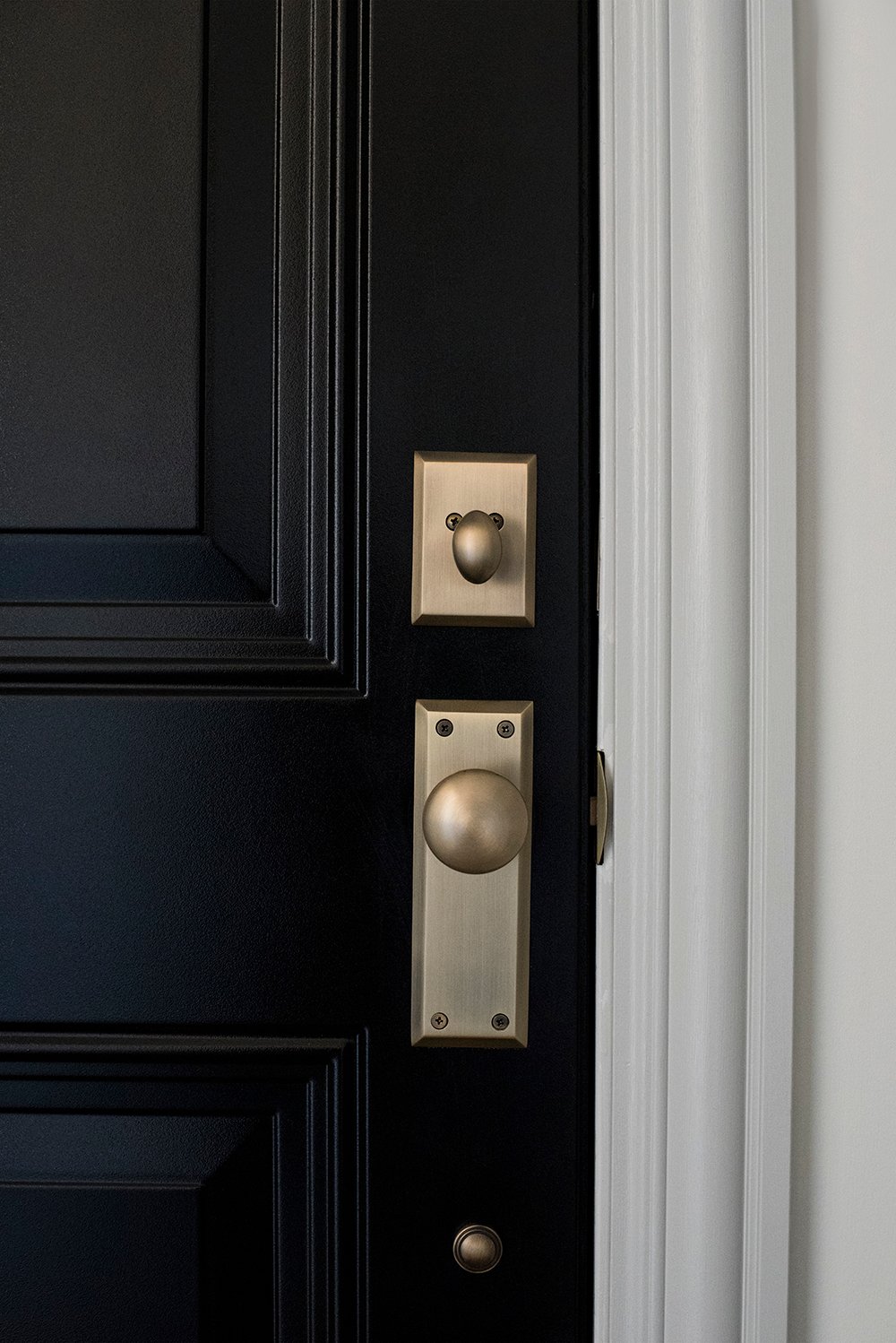 Brass Hardware on Black Exterior Door Room For Tuesday