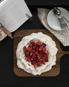 Pavlova with Soaked Strawberries & Vanilla Cream