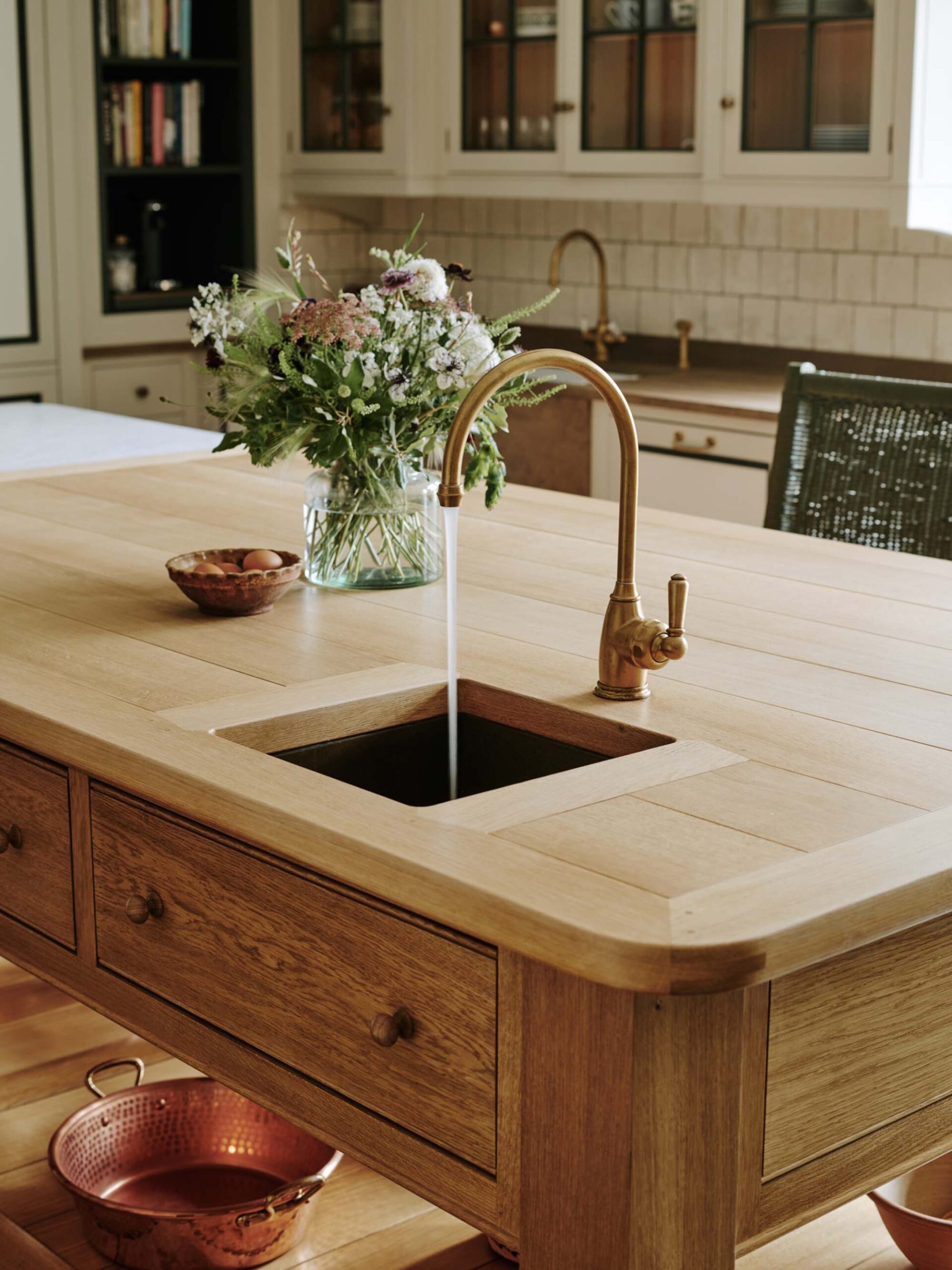 Wood-Kitchen-Island-with-Brass-Sink-and-Wood-Countertop