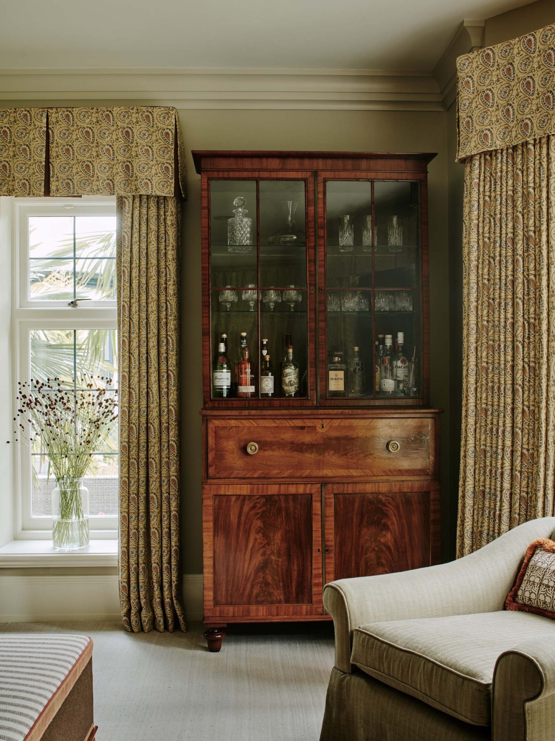 drinks-cabinet-for-sitting-room-with-arm-chair