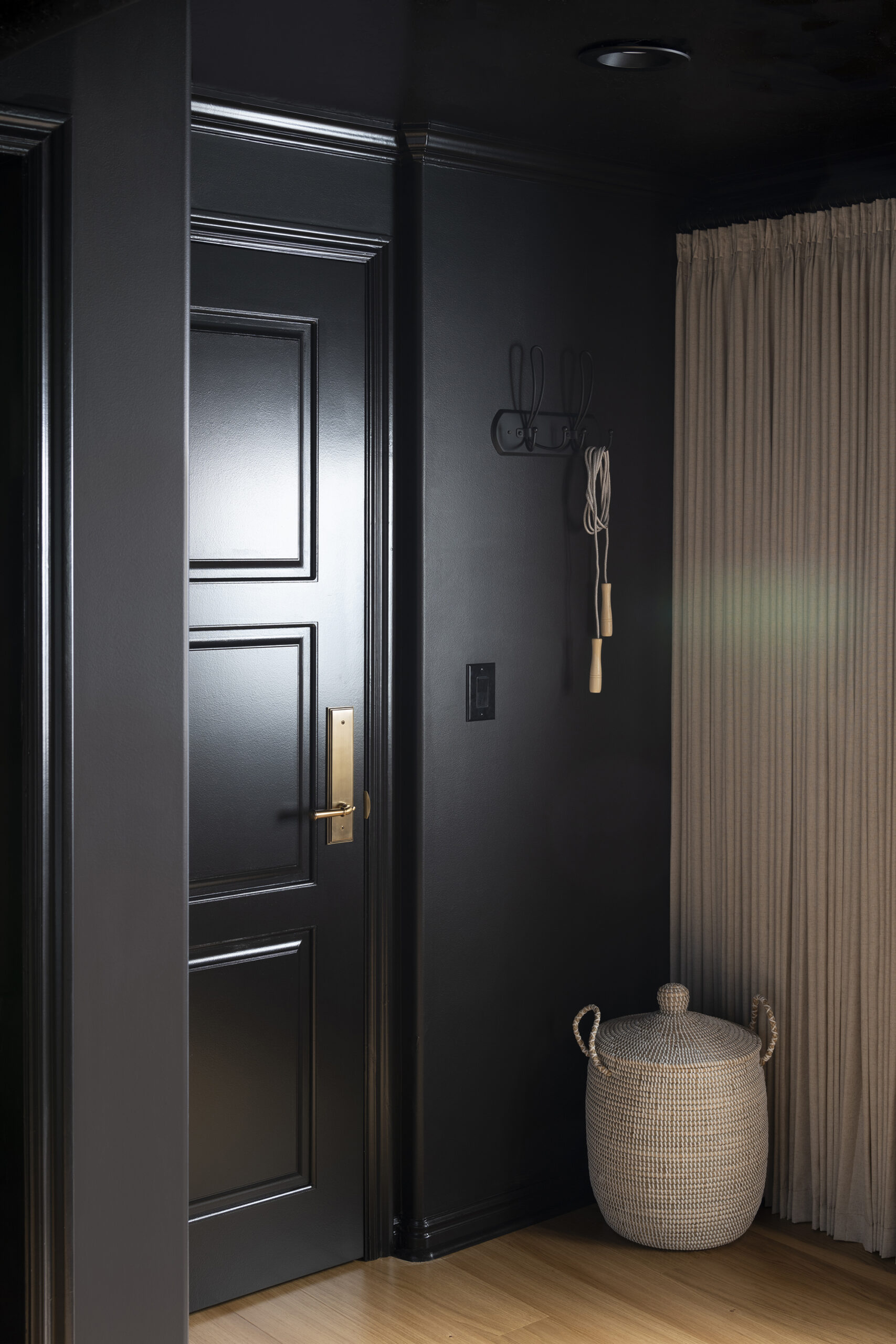 Black Door and Walls in Basement Home Gym