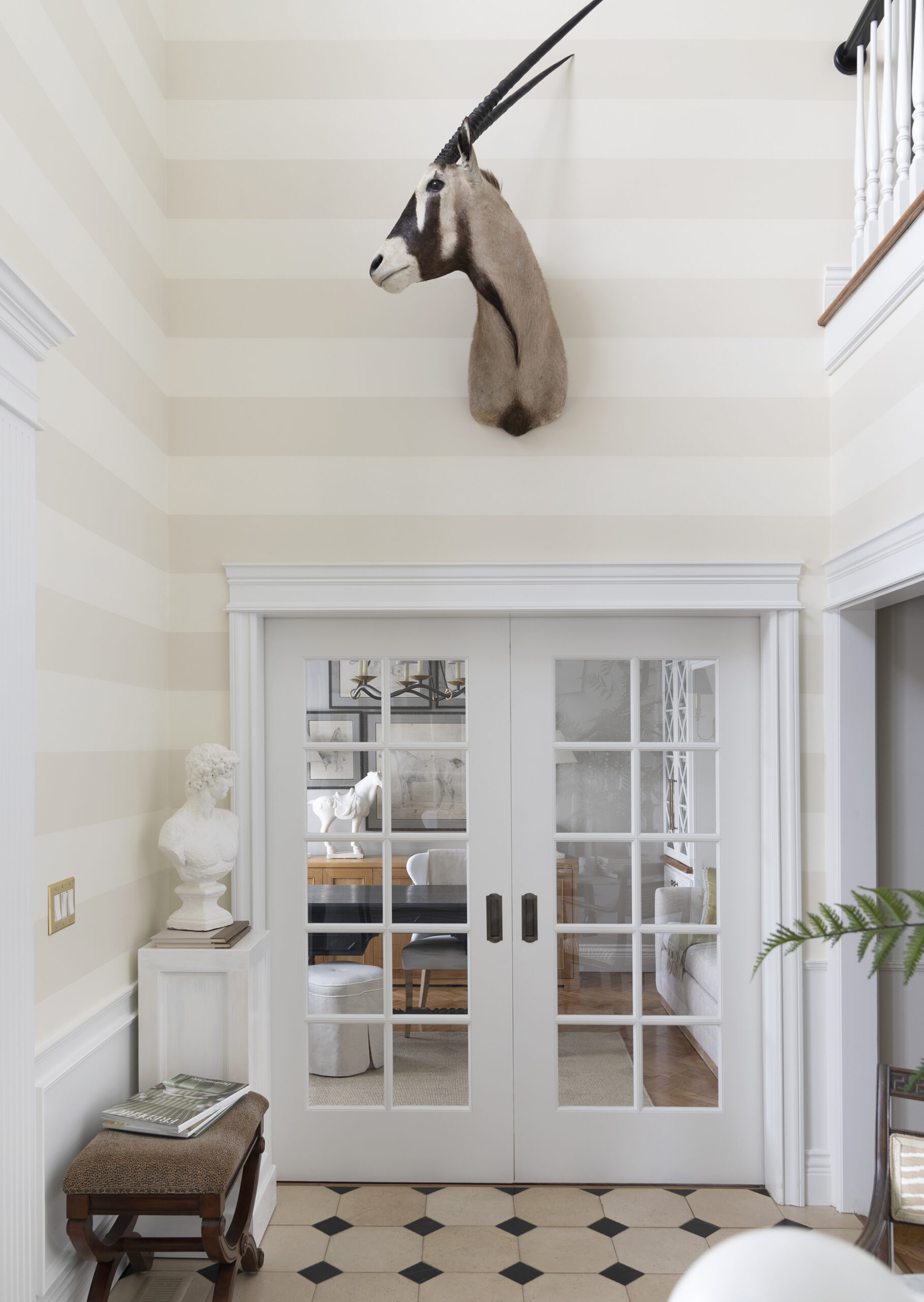 Layered Foyer with French TIle and Taxidermy