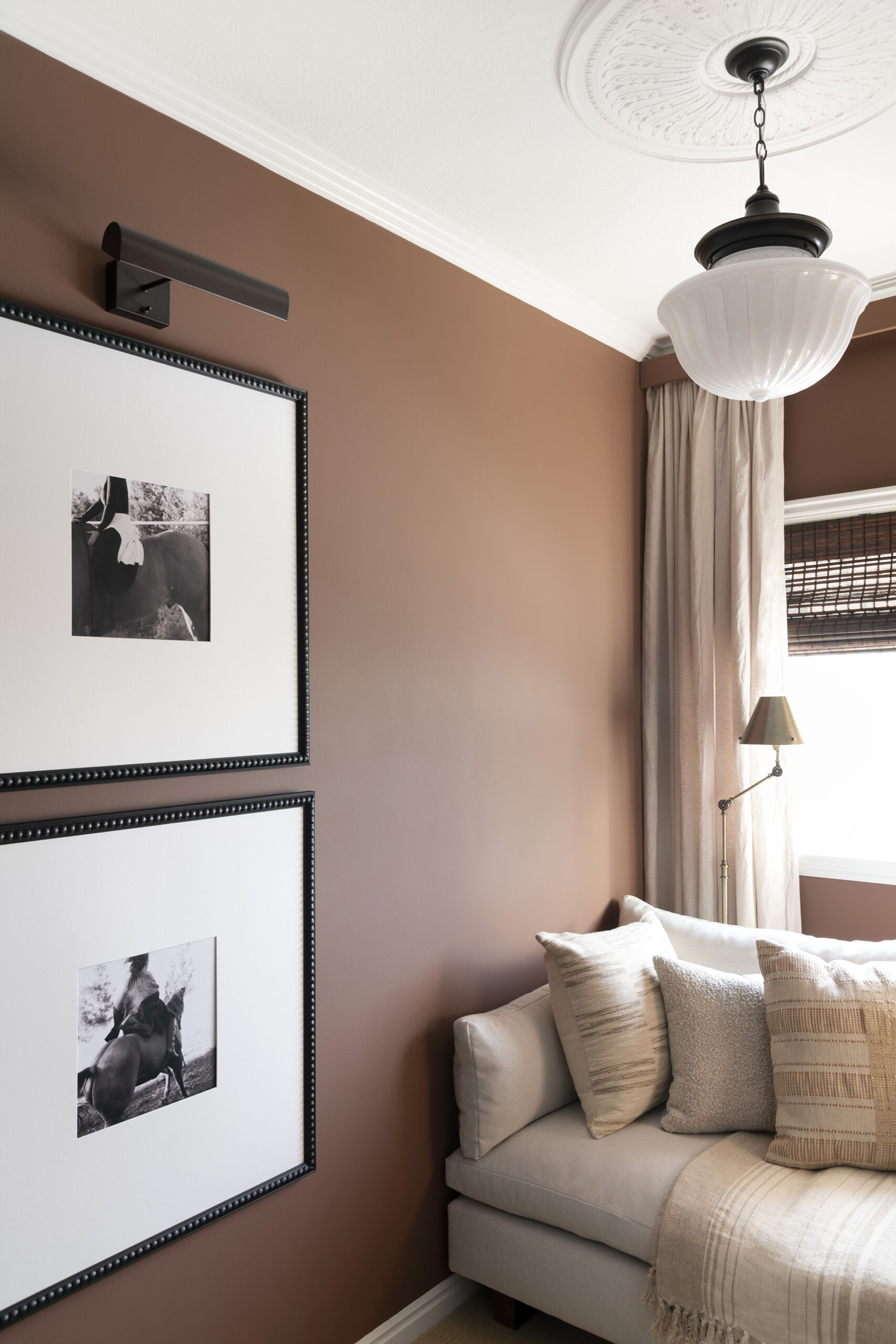 Layered Lighting in Corner Window Nook with Cozy Sofa