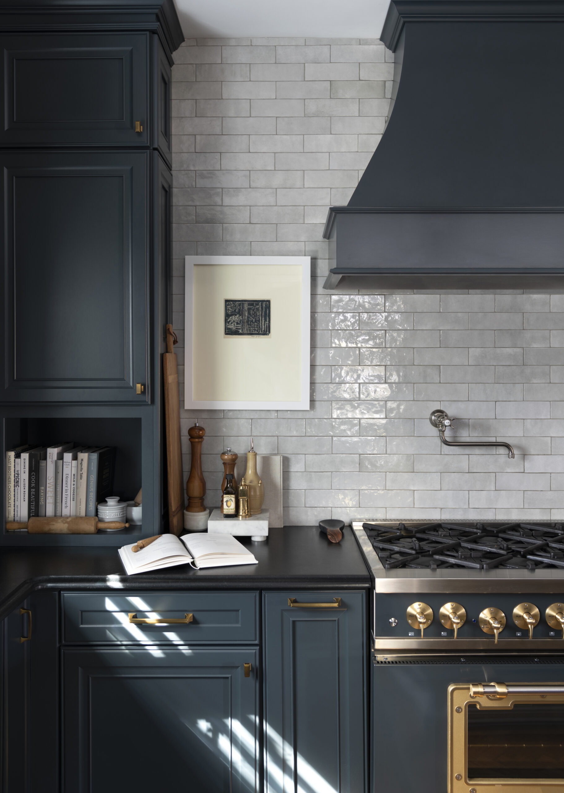Mixed Metals in Dark Navy Kitchen with Gray Tile Backsplash