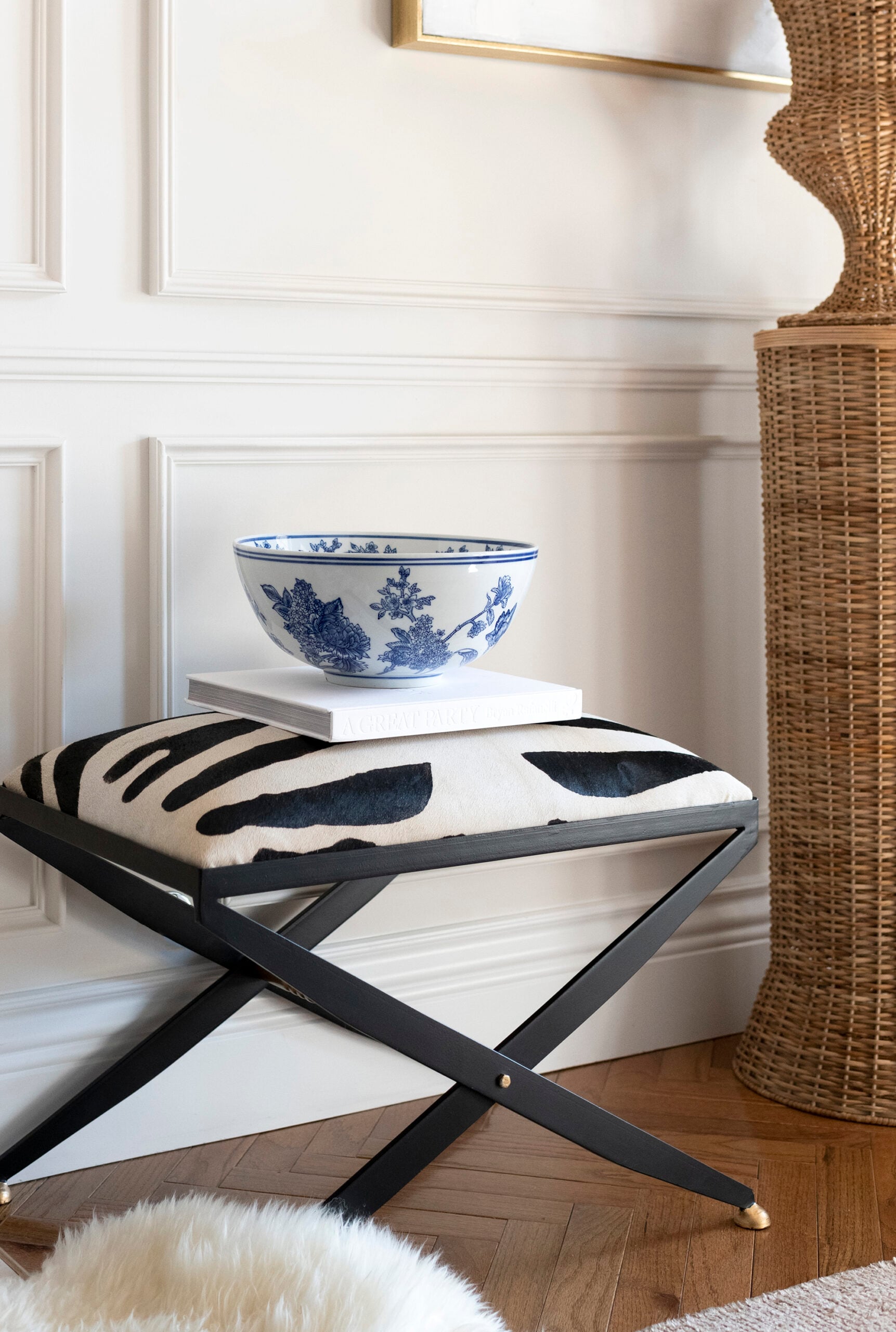Blue and White Bowl on Zebra Ottoman