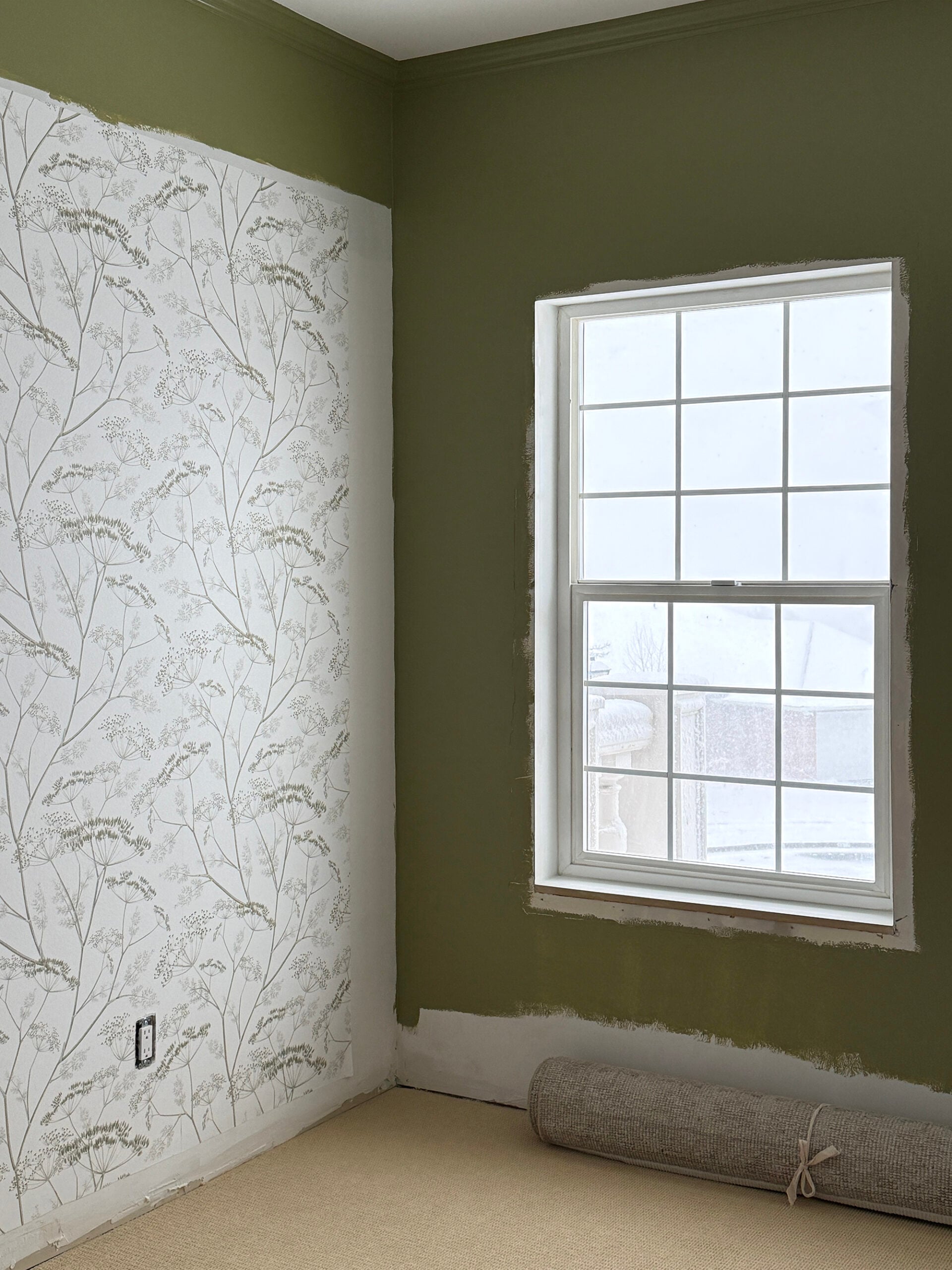 Nursery Renovation in Progress with Wallpaper and Green Paint