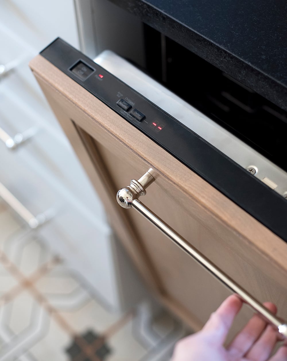 Polished Nickel Appliance Pull on Dishwasher