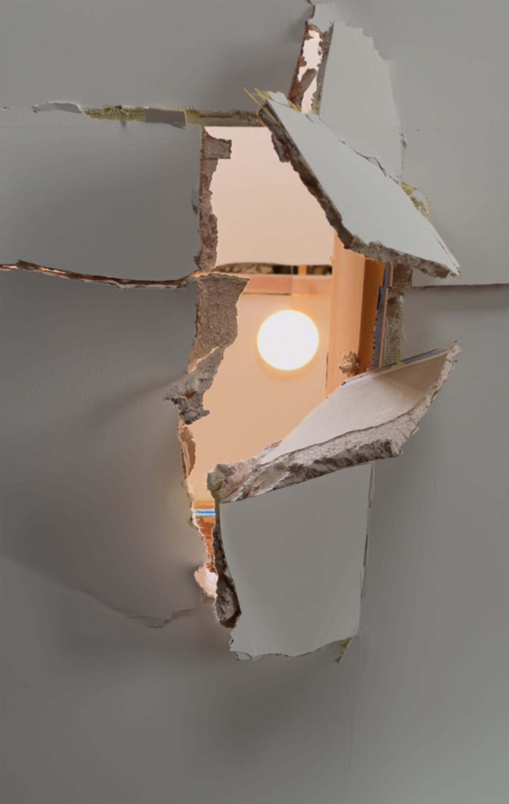 View-from-the-Busted-Kitchen-Ceiling-Into-the-Bathroom