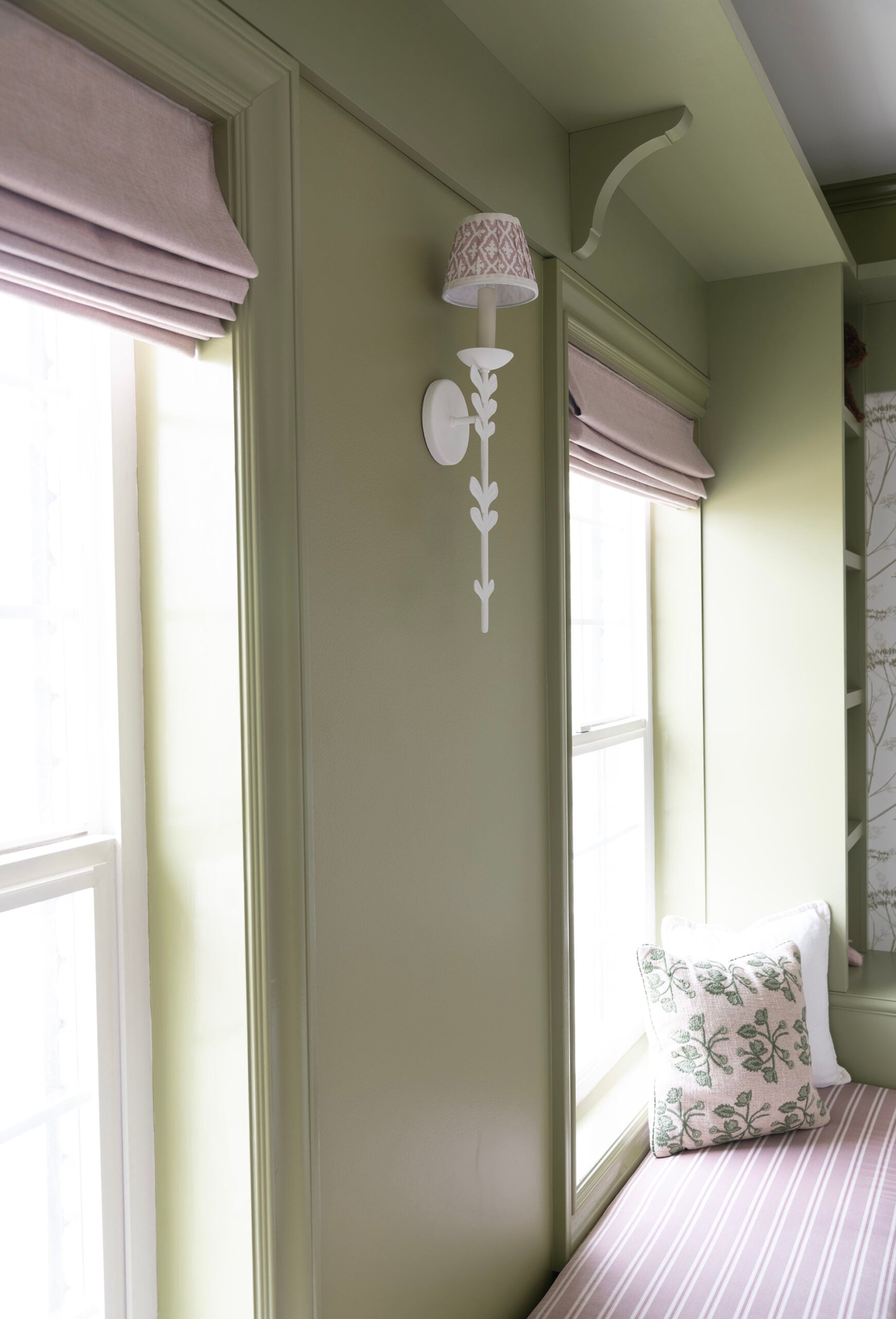 Green Girl Nursery with Lilac Window Bench Seat and Floral Sconce