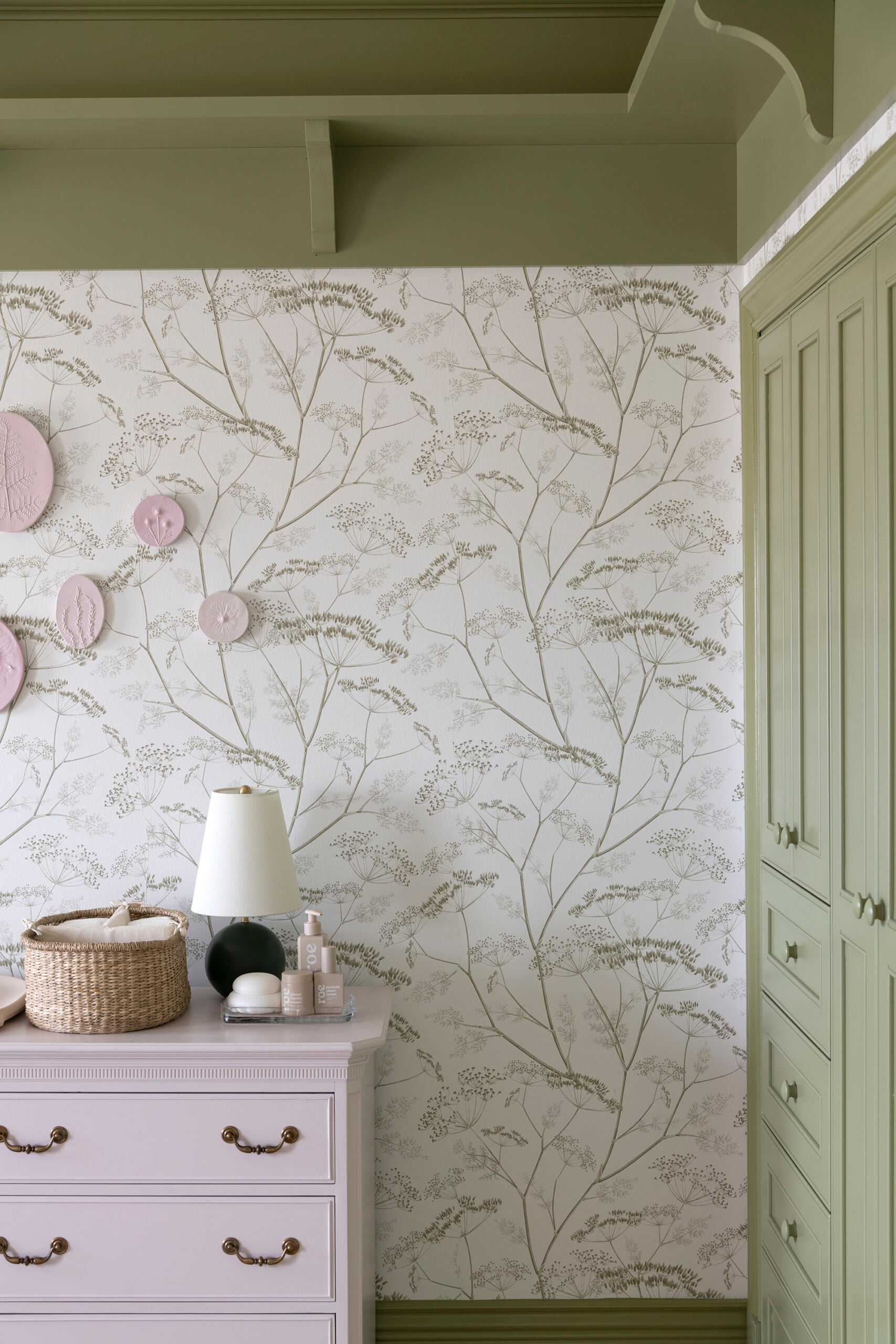 Plaster Intaglios Above Changing Table Dresser in Nursery