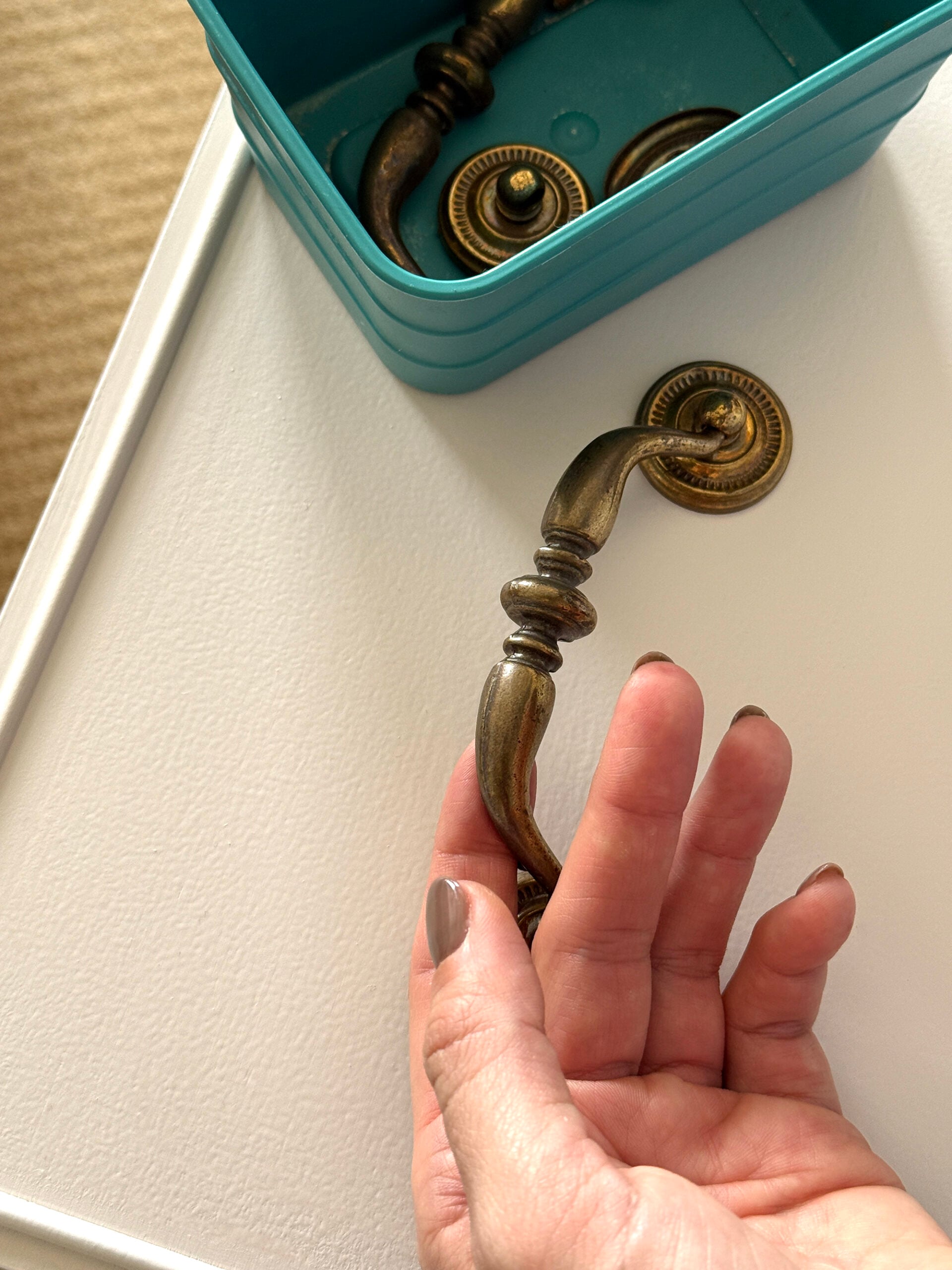 Reinstalling Polished Hardware on Dresser Makeover