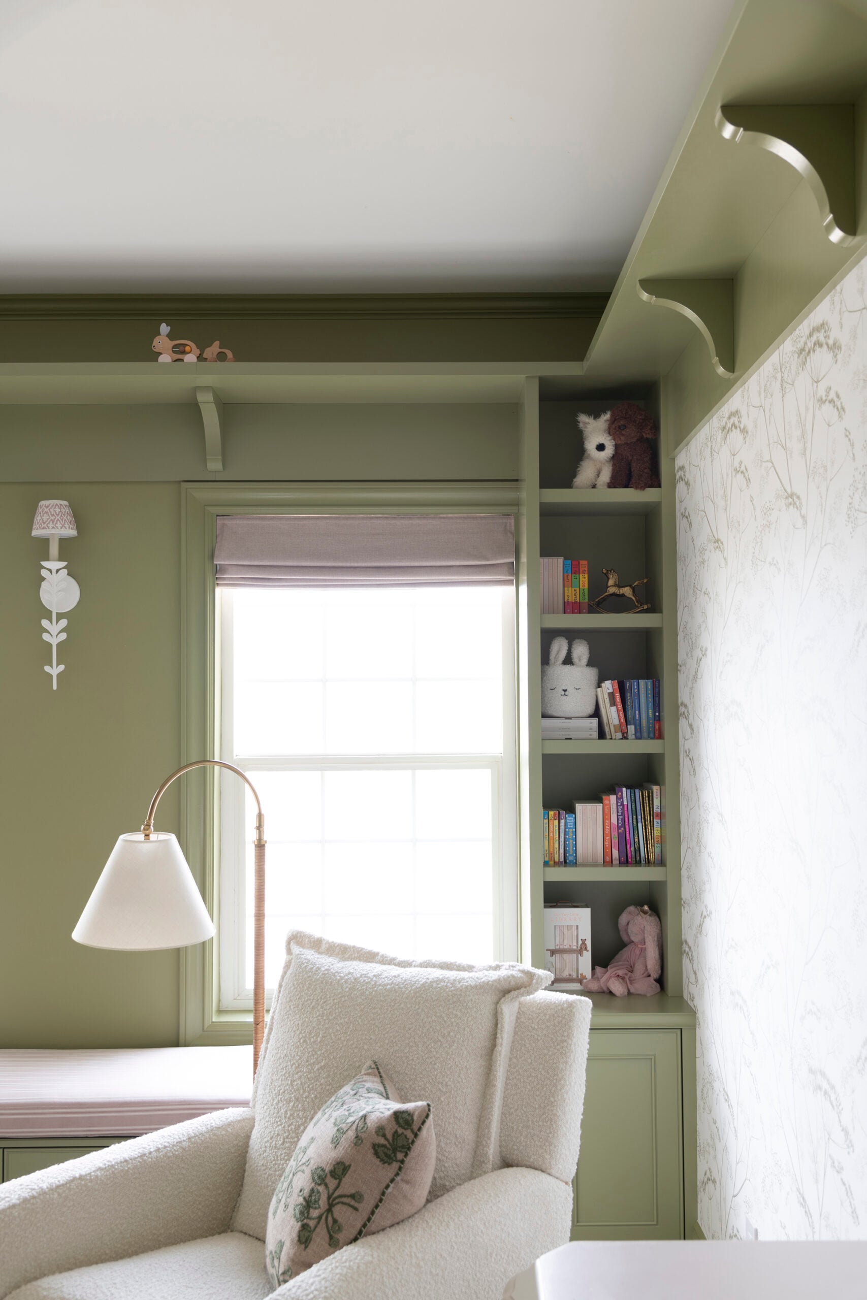 White Boucle Swivel Glider Recliner in Green Girl Nursery with Bench Seat and Floral Wallpaper