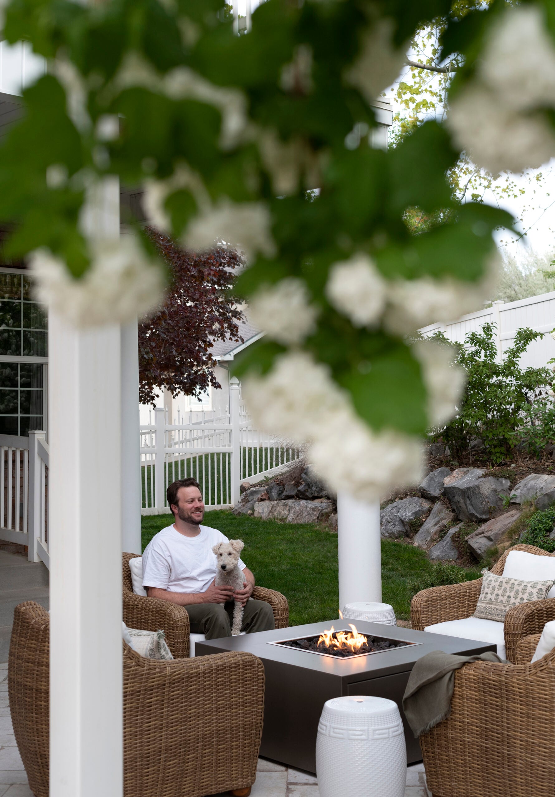 Sitting on Patio with Dogs Around Fire Pit