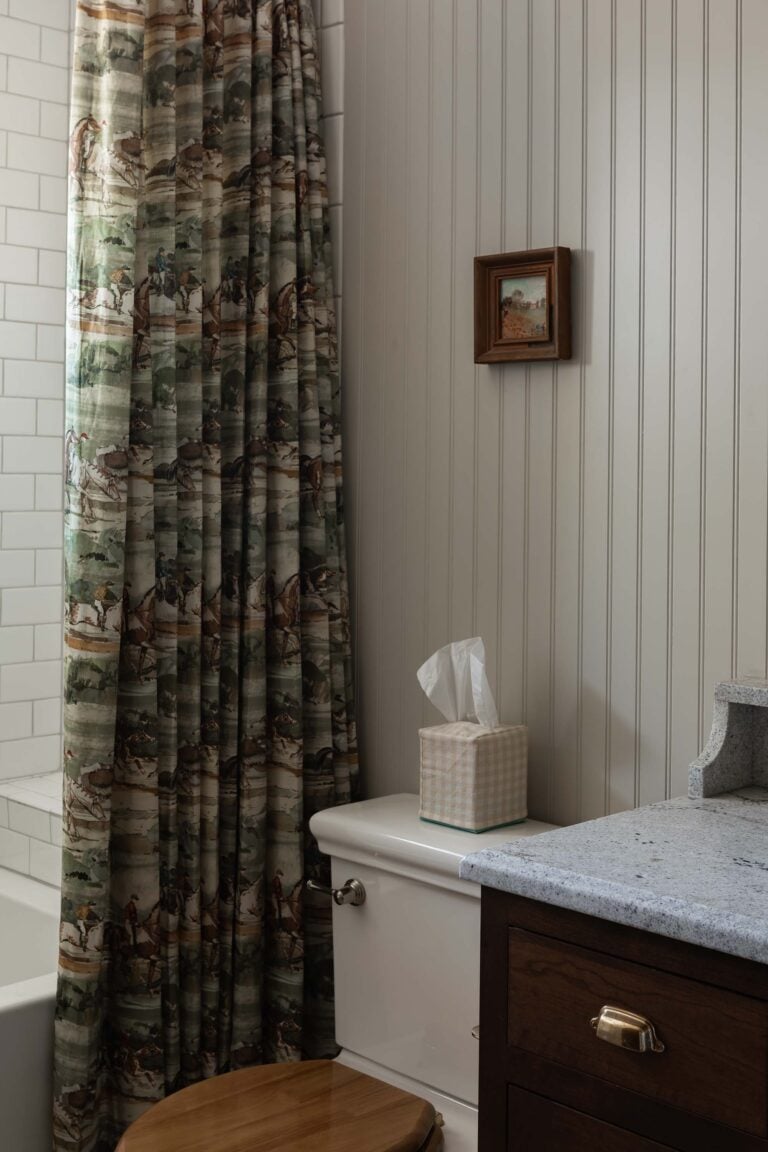 Oho Interiors-Carriage House-Bathroom with Pattern Shower Curain and Wooden Toilet Seat