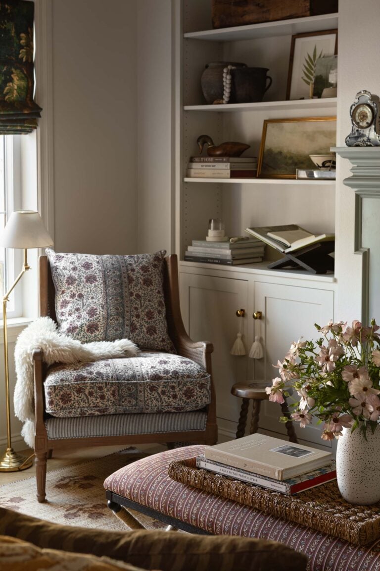 Oho Interiors-Carriage House-Chair between window and built ins by fireplace