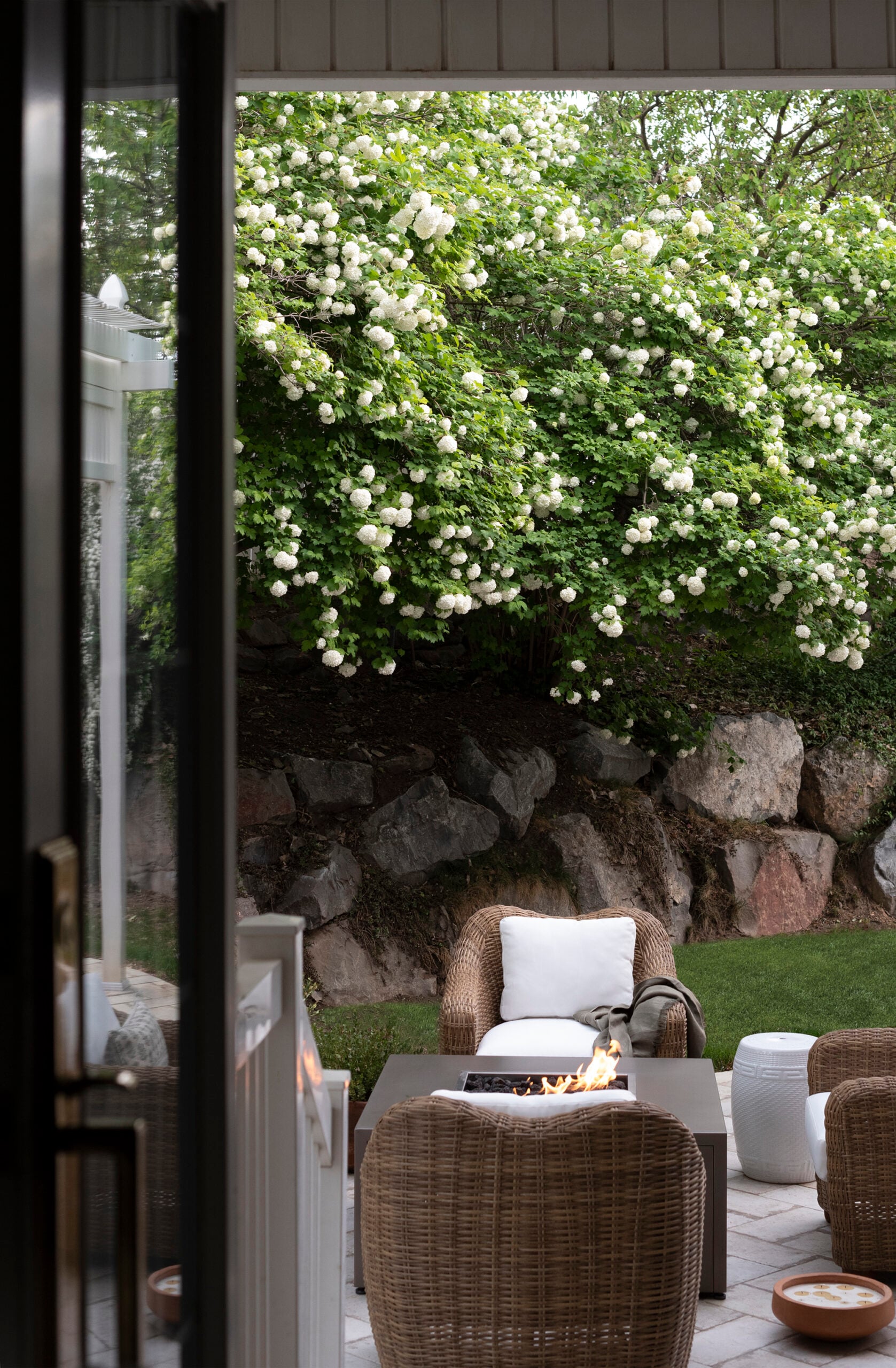 Outdoor Seating Around Firepit with Snowball Viburnum