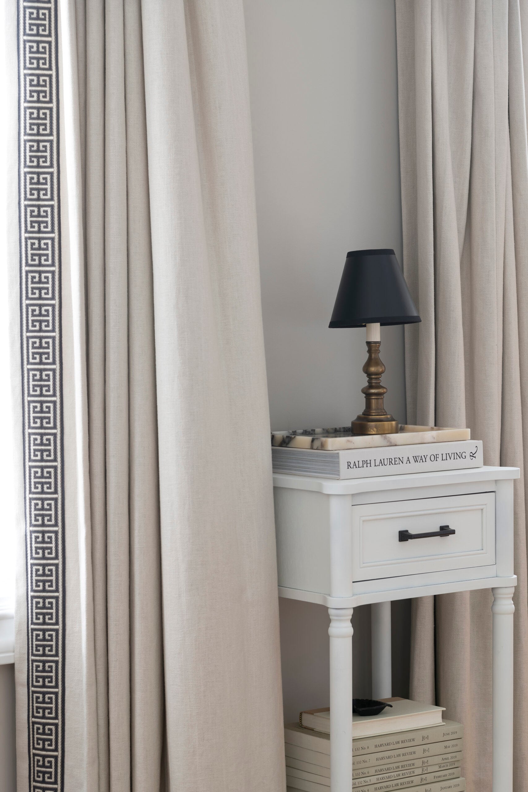Small Table Lamp on Ralph Lauren Book Sitting on a Side Table