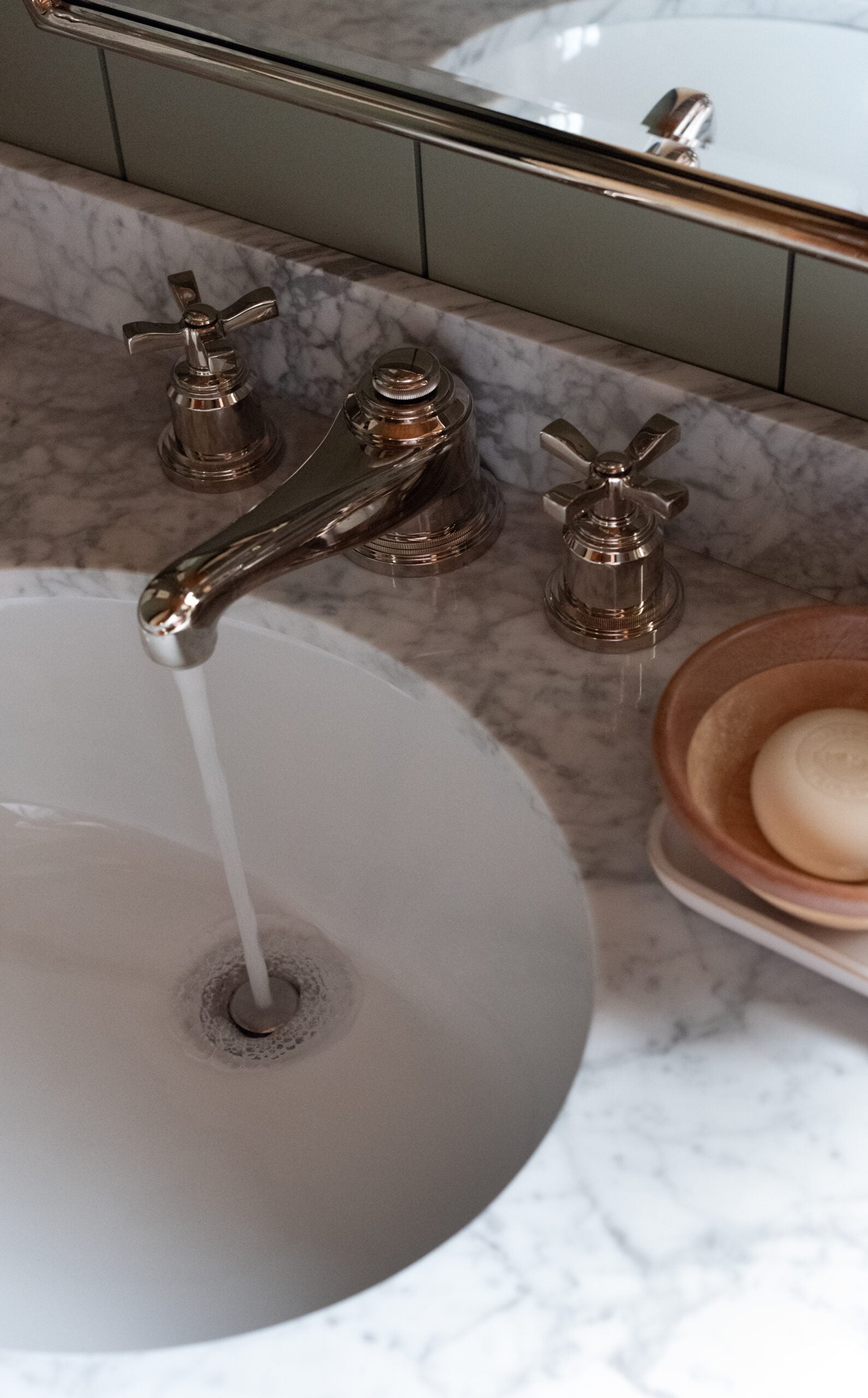 Rigdon Polished Nickel Widespread Faucet from Rejuvenatin on Marble Countertop