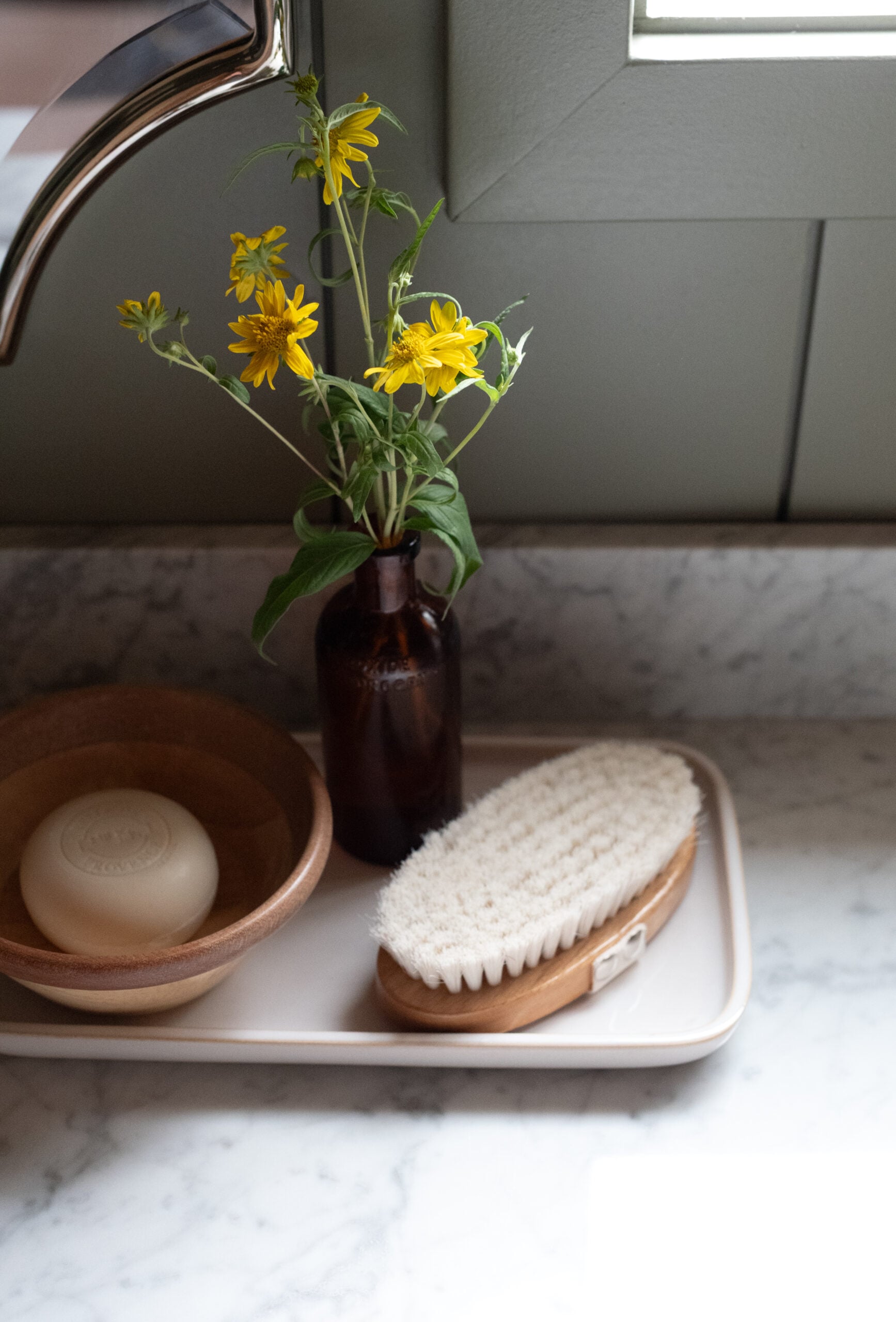 Round Soap Bar in Wooden Bowl with Flowers and Scrub Brush