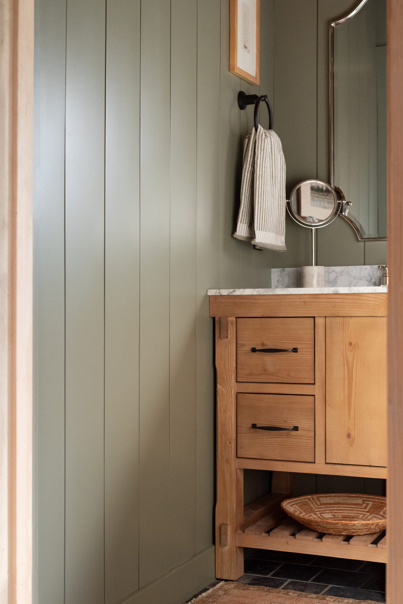 Wood Vanity in Green Cabin Bathroom with Slate Floor Tile