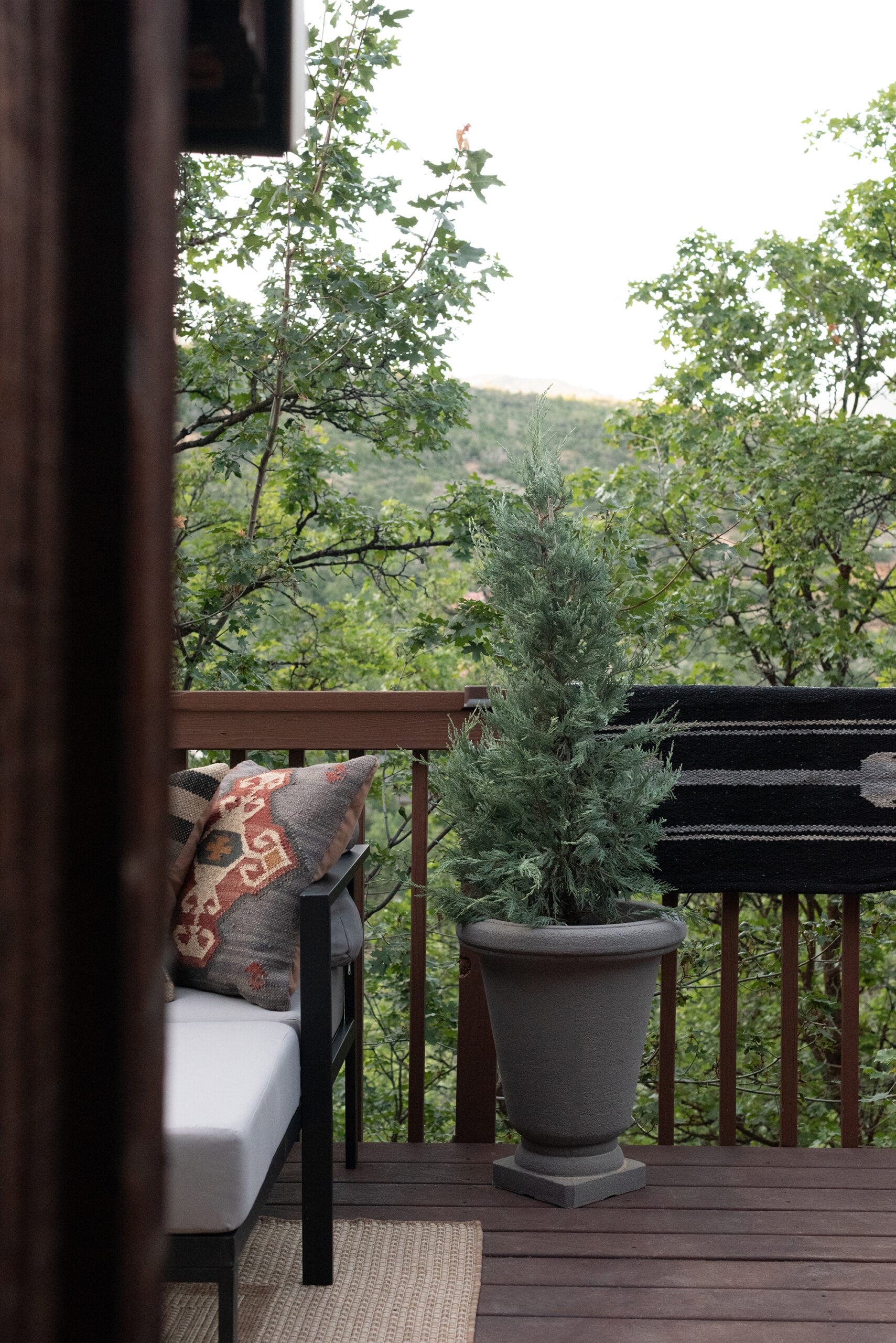 Cabin Deck with Juniper Planter and Outdoor Seating