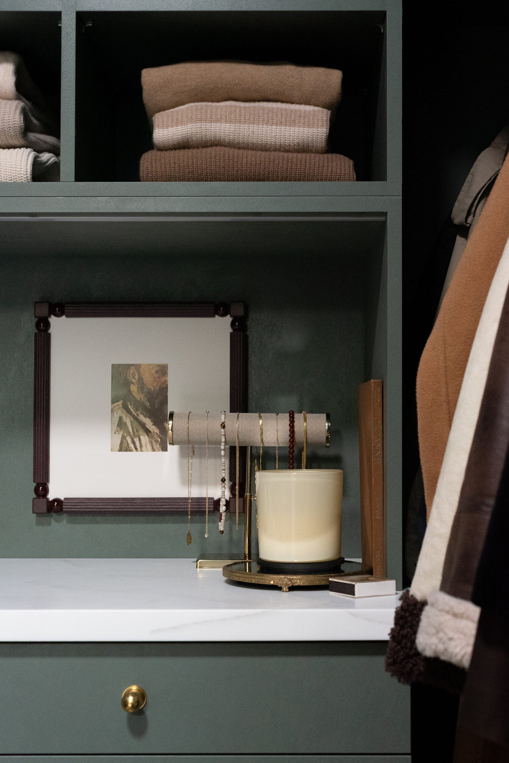 Dark Green Closet with Jewelry Stand and Art