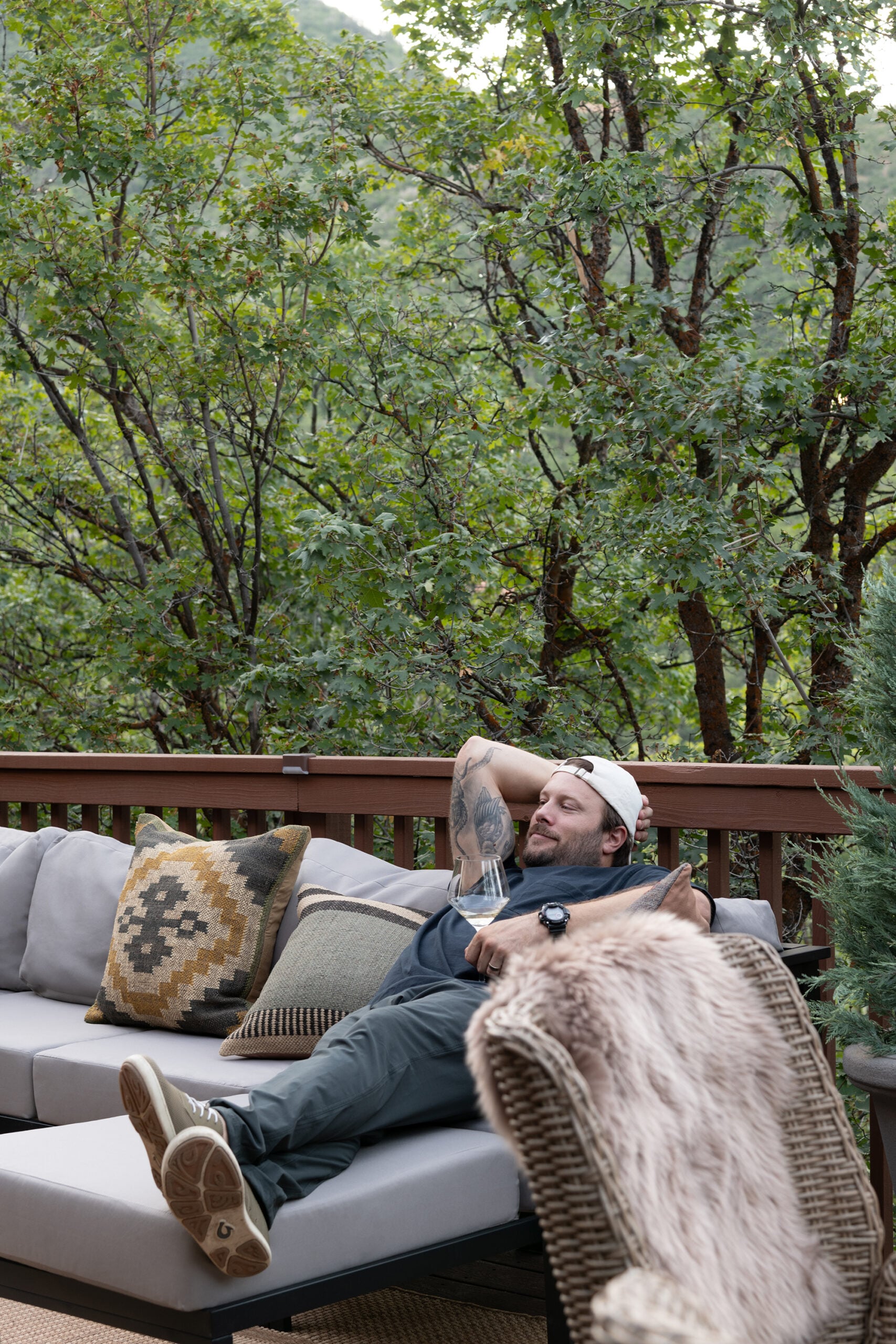 Emmett with Glass of Wine on Cabin Deck Outdoro Sectional