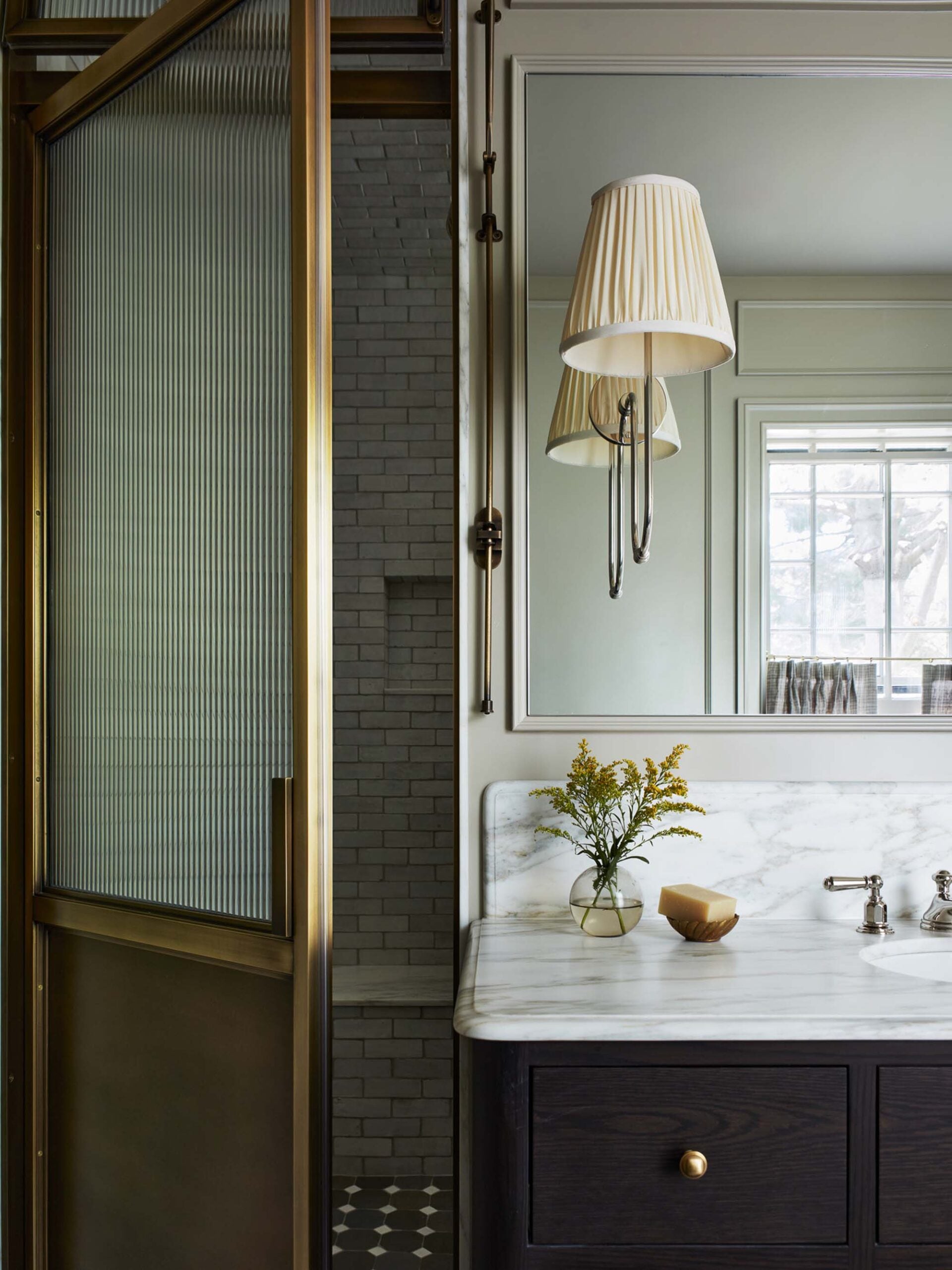 Primary Bathroom Shower Door and Vanity