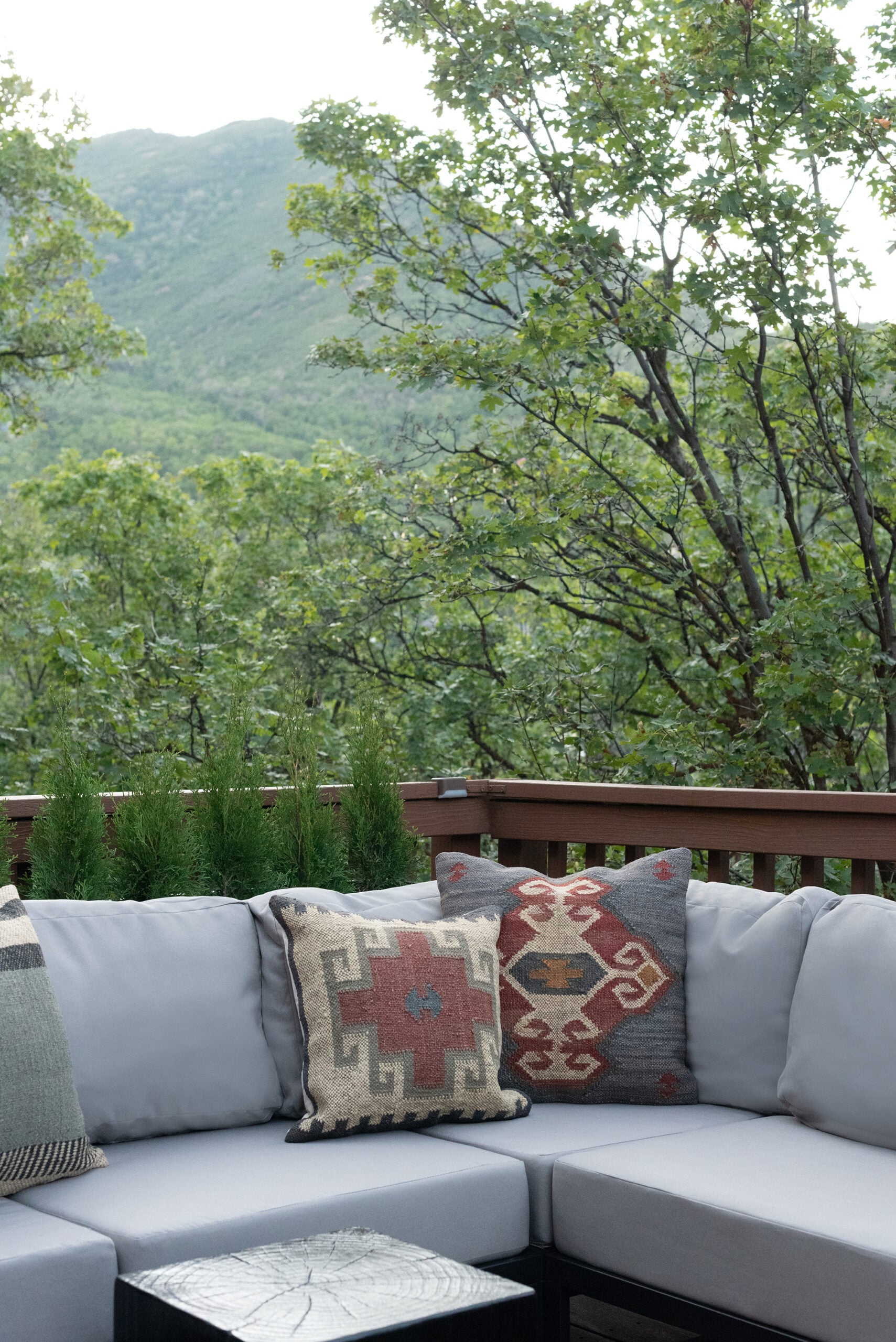 Southwest Pillows on Outdoor Sectional on Cabin Deck with Mountain View