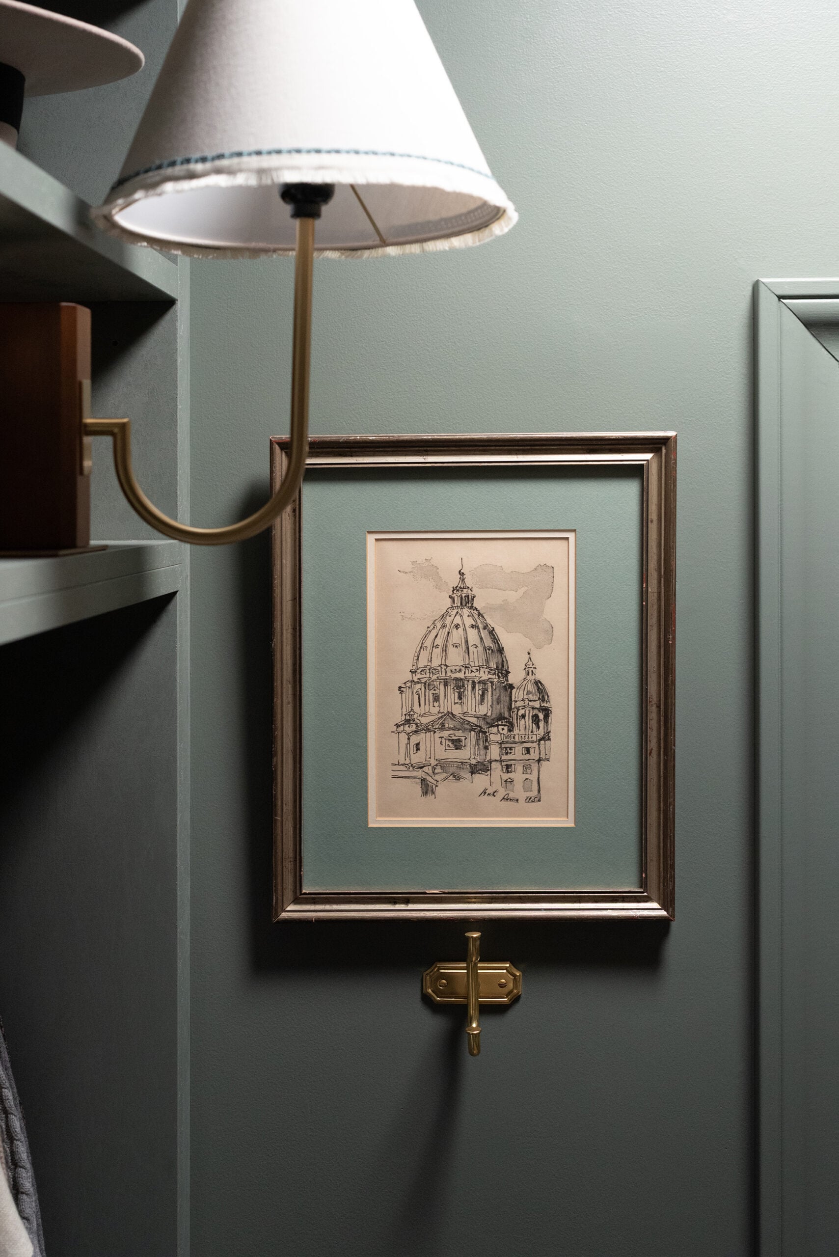 Vintage Roman Duomo Art with Green Mat Against Green Wall with Sconce