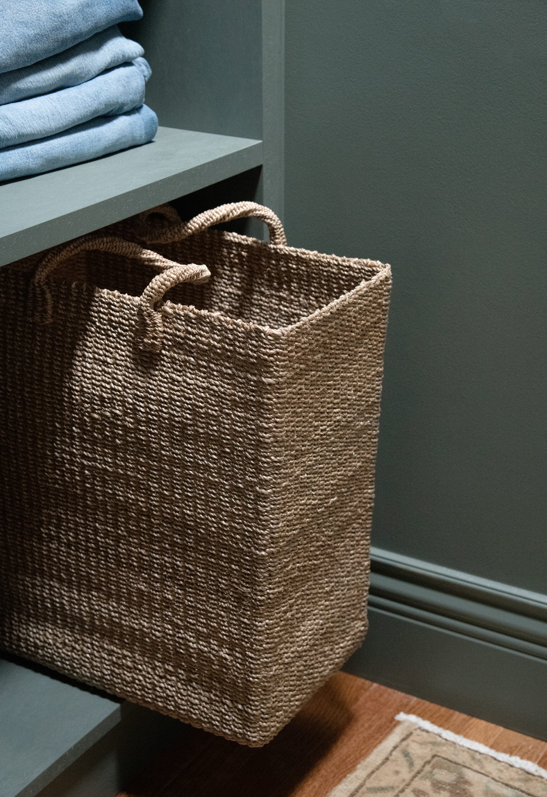 Woven Laundry Hamper in Green Closet