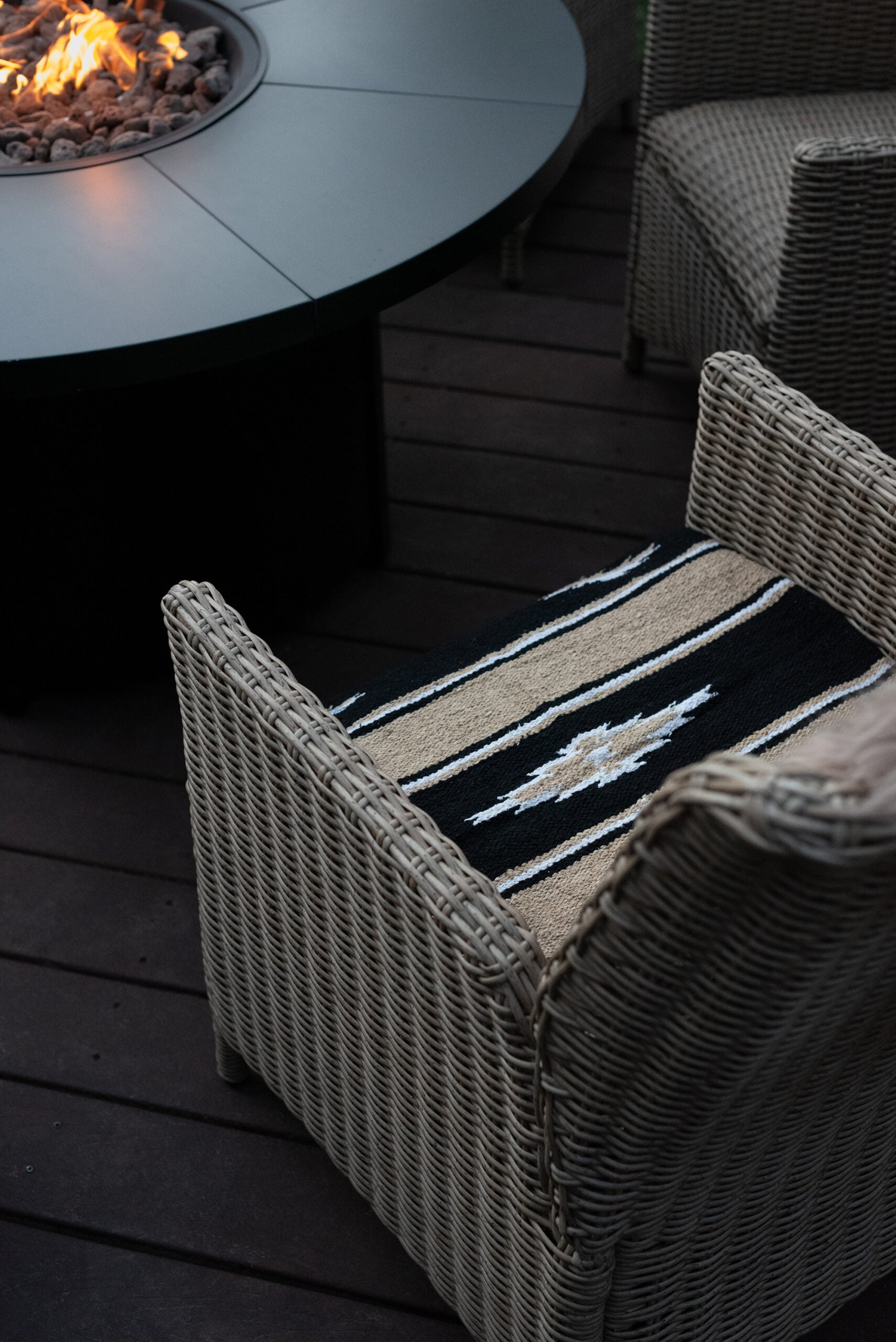 Saddle Blanket on Woven Outdoor Chair Around Fire Pit