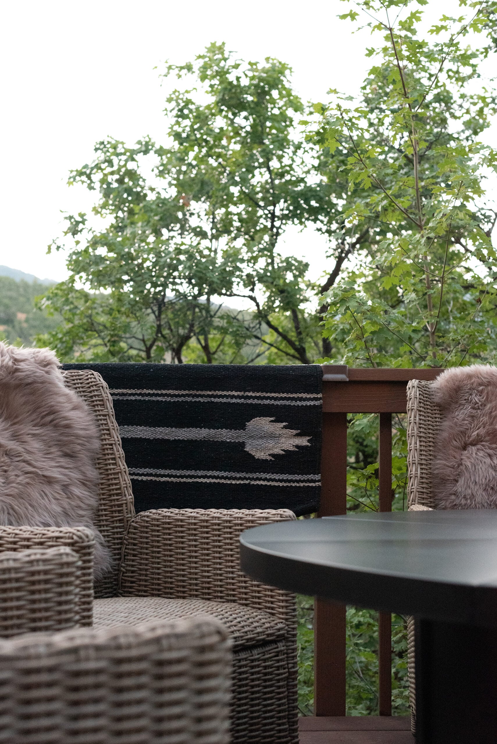 Southwestern Saddle Blanket Near Outdoor Fire Pit with Woven Chairs