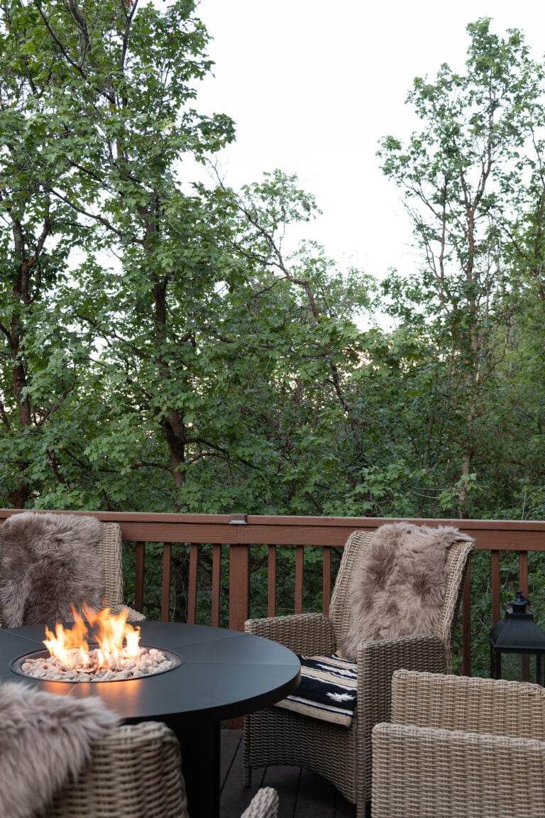 Woven Chairs Around Fire Pit at Mountain Cabin