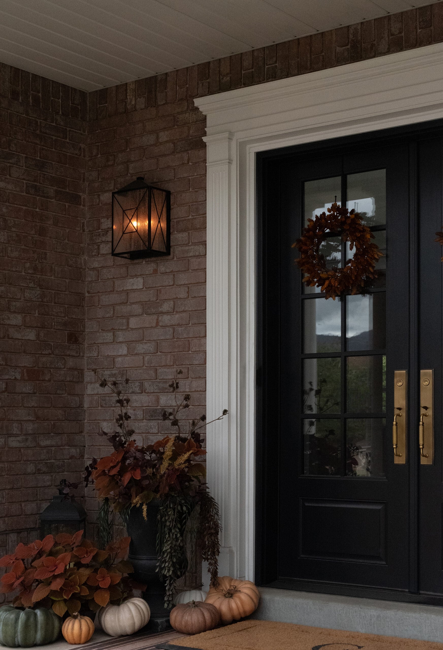 Fall Front Porch with Flickering Gas Lantern and Pumpkins