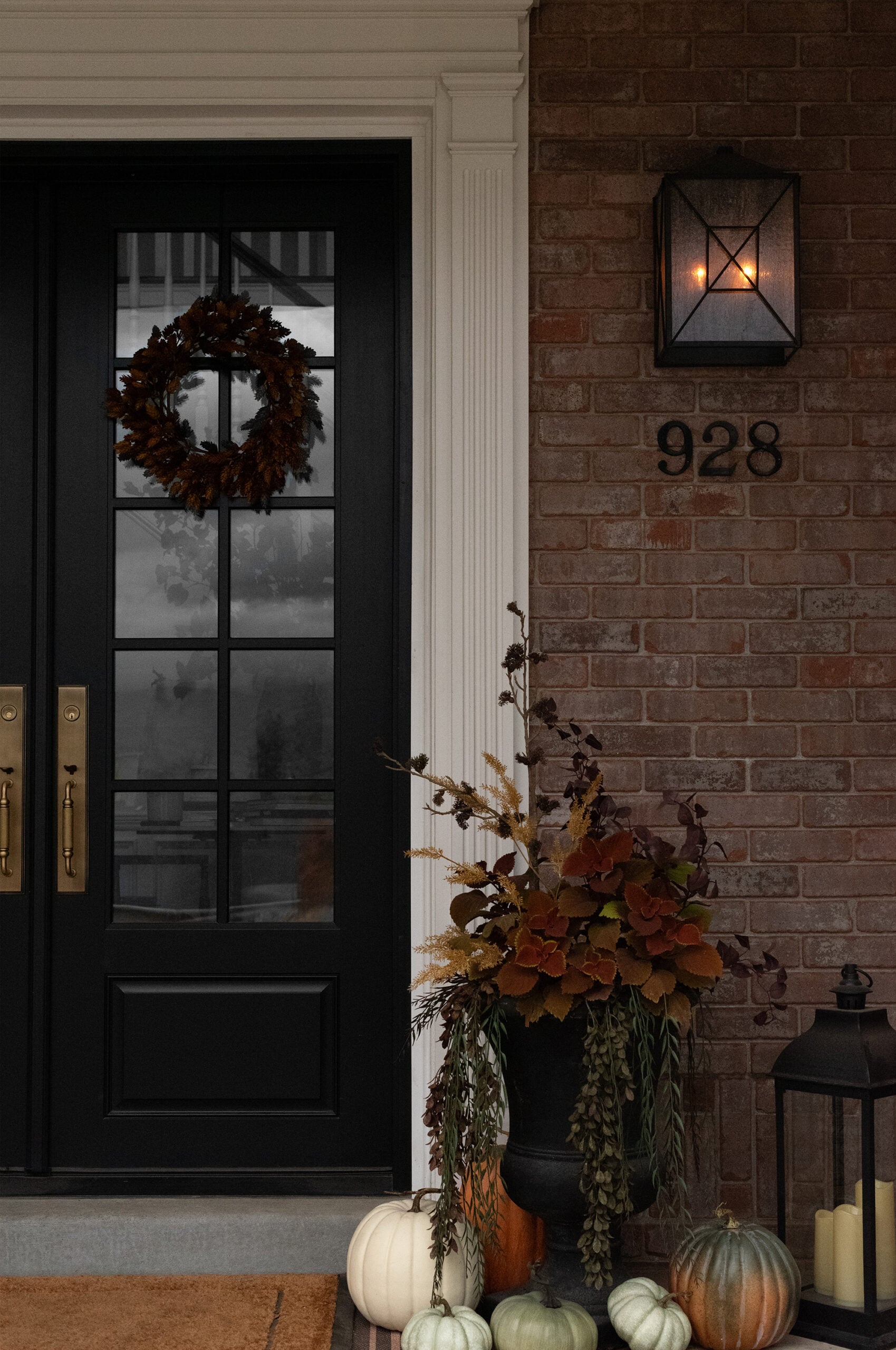 Front Porch Decorated with Pumpkins and Plants for Fall