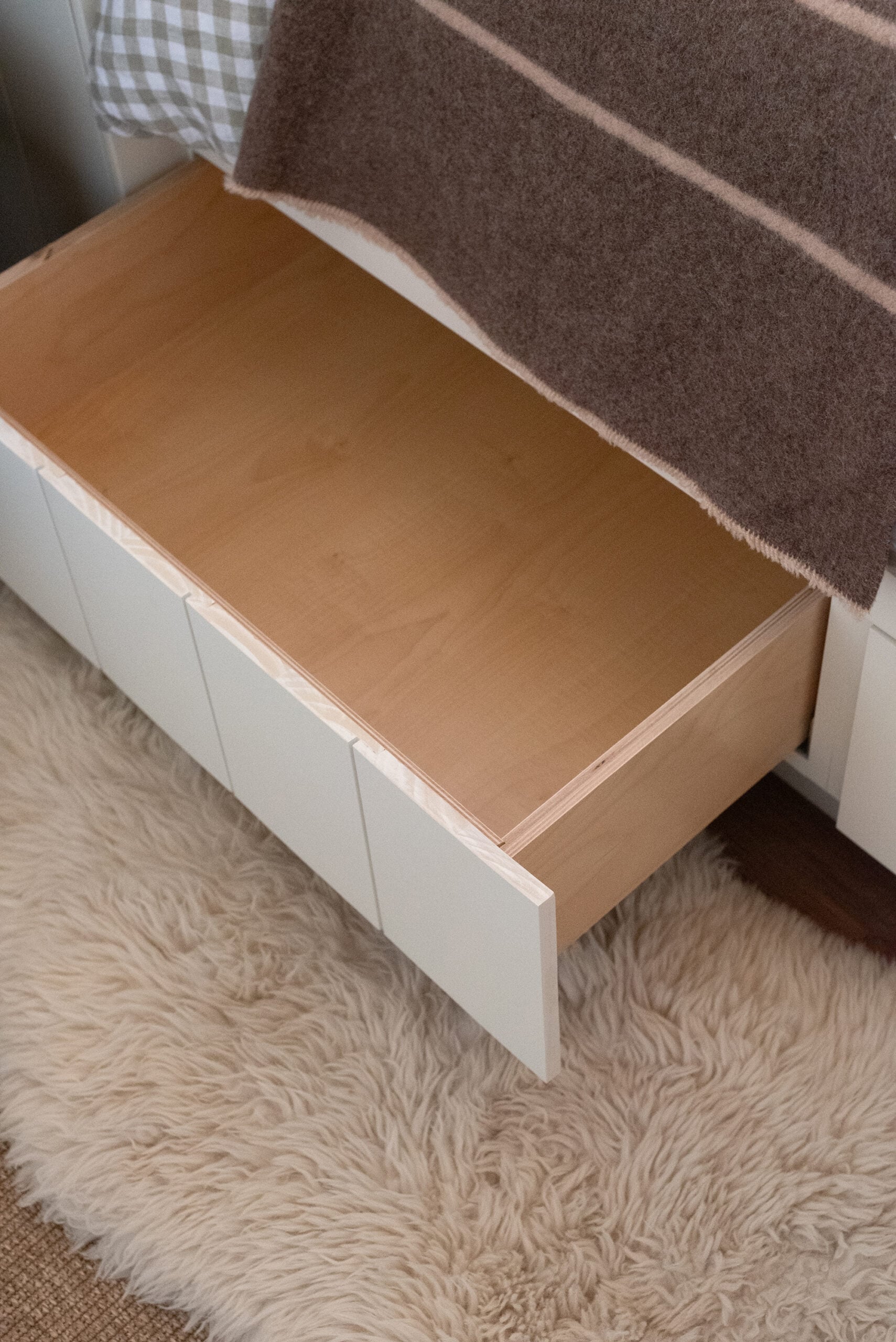 Hidden Storage Drawer Beneath Built-In Bed