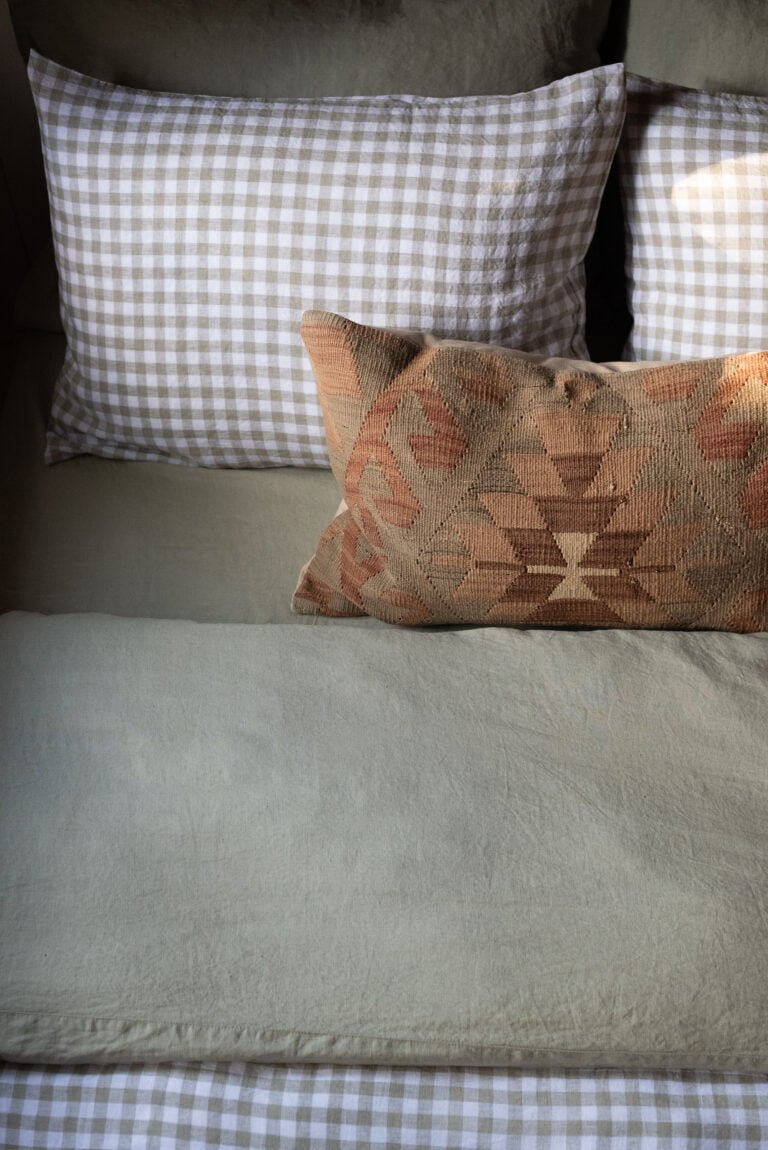Luxe Linen Bedding from Quince with a Vintage Lumbar Pillow